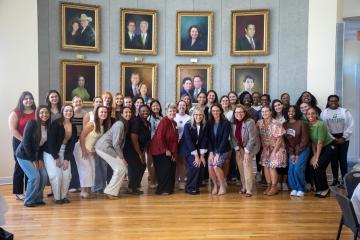 A Photo of FSU Law Students Posing during a Women in Law Symposium Event