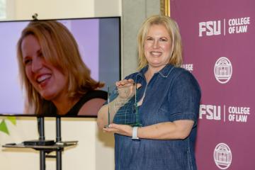 A Photo of Becky Shepherd Posing at her 20th Anniversary Celebration