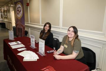 Welcome Table and FSU Staff During AI Day in the Capital Event
