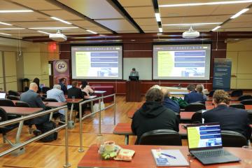 Caryn Lavernia Moderating Panelists Rich Harper, Ben Odom, Ronak Ray, and Lauren Scholz at AI Day in the Capital Event