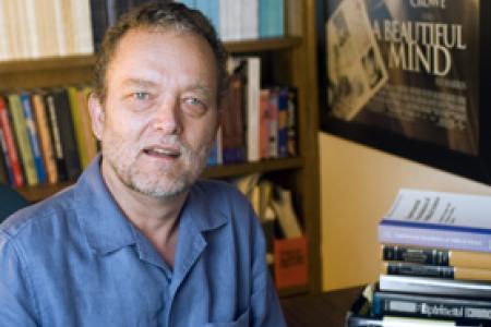 R. Mark Isaac