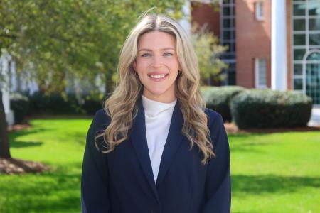 Picture of Sterling Lee in front of the Rotunda building