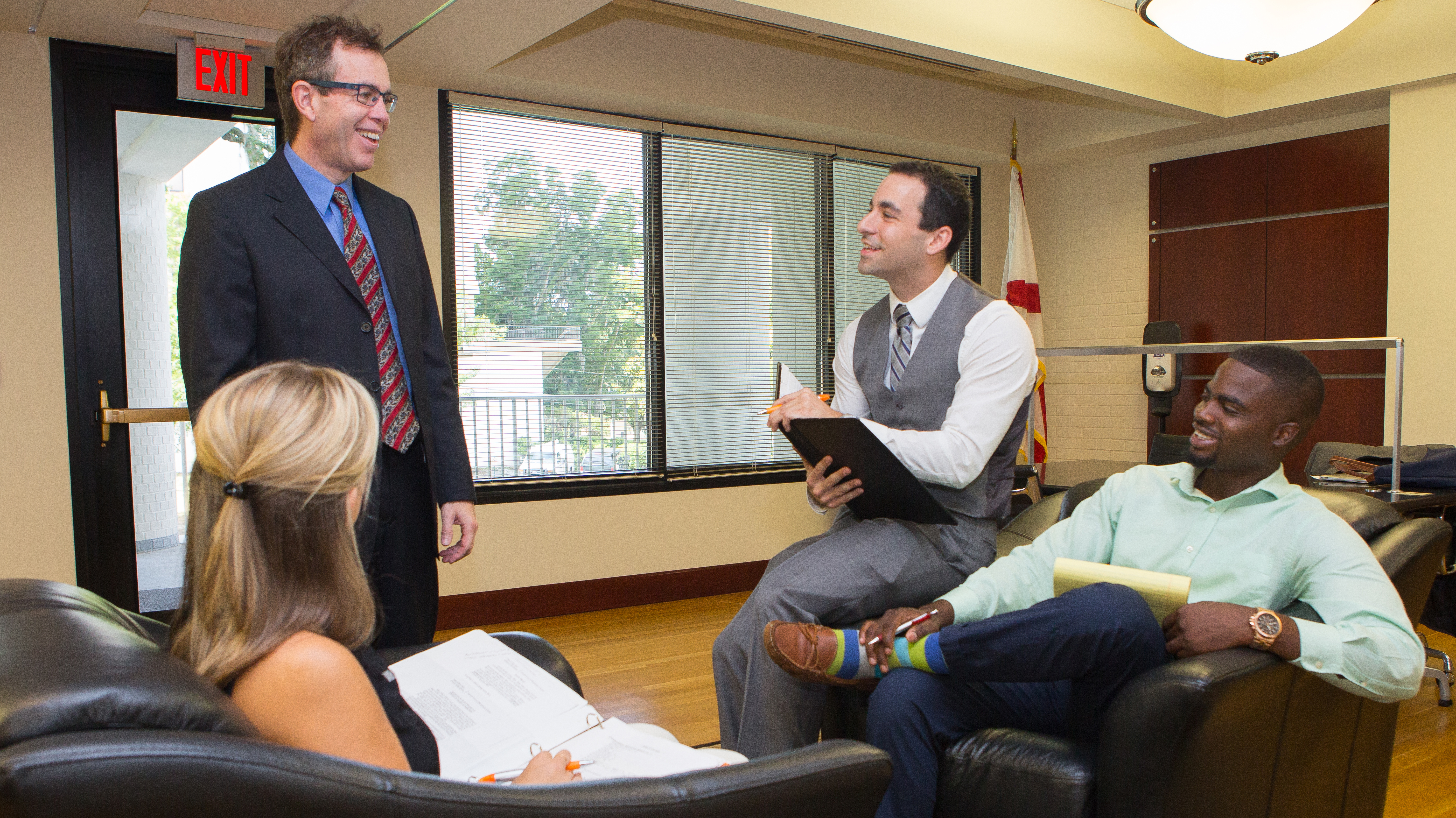 Faculty member meets with students