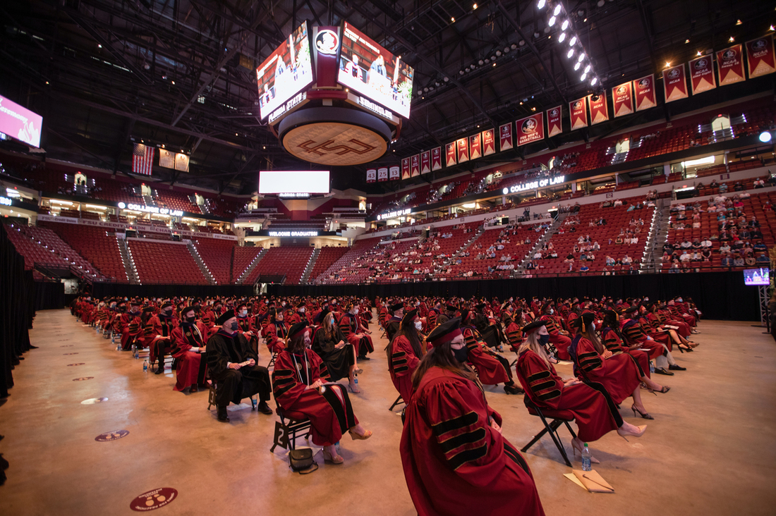 Graduates seated at Tucker Center