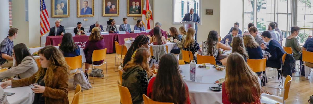 Students listen to panel