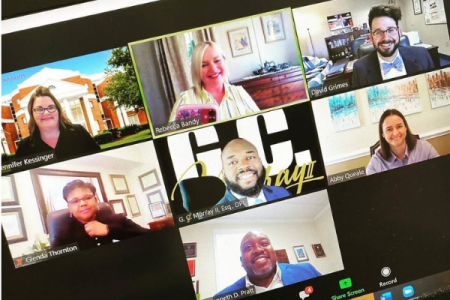 Alumni smiling on Zoom screen