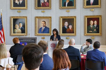 Judge Sneed addresses crowd at lunch.